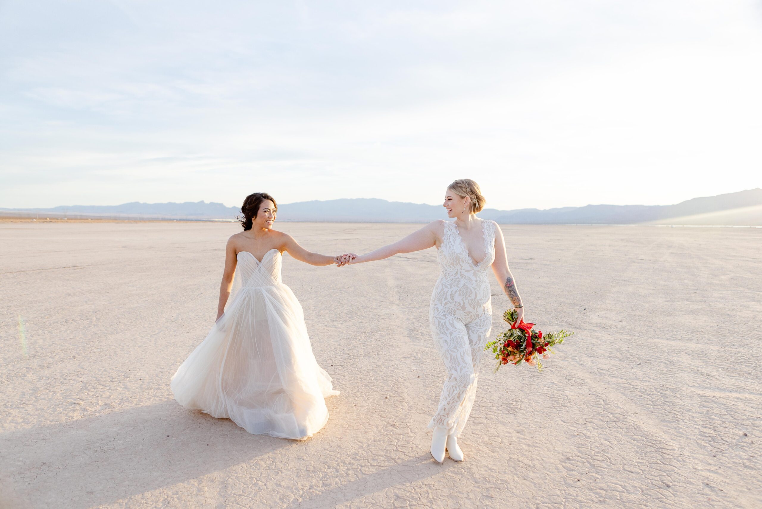 Couple walks hand in hand in the desert after a Las Vegas Elopement