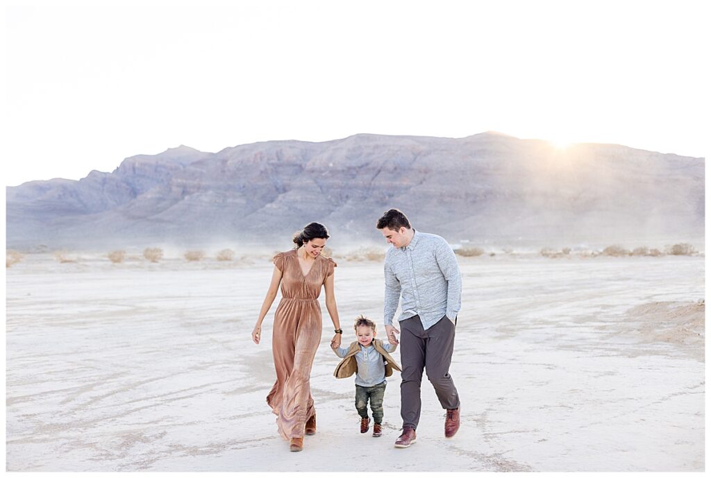 Family Photographer Henderson Nevada captures a beautiful family walking in a wide open desert